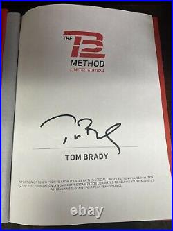 TB12 method book signed by Tom Brady