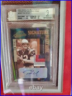 Tom Brady Jersey shadow Box With 9 auto items. 6 graded cards/ game used cleats